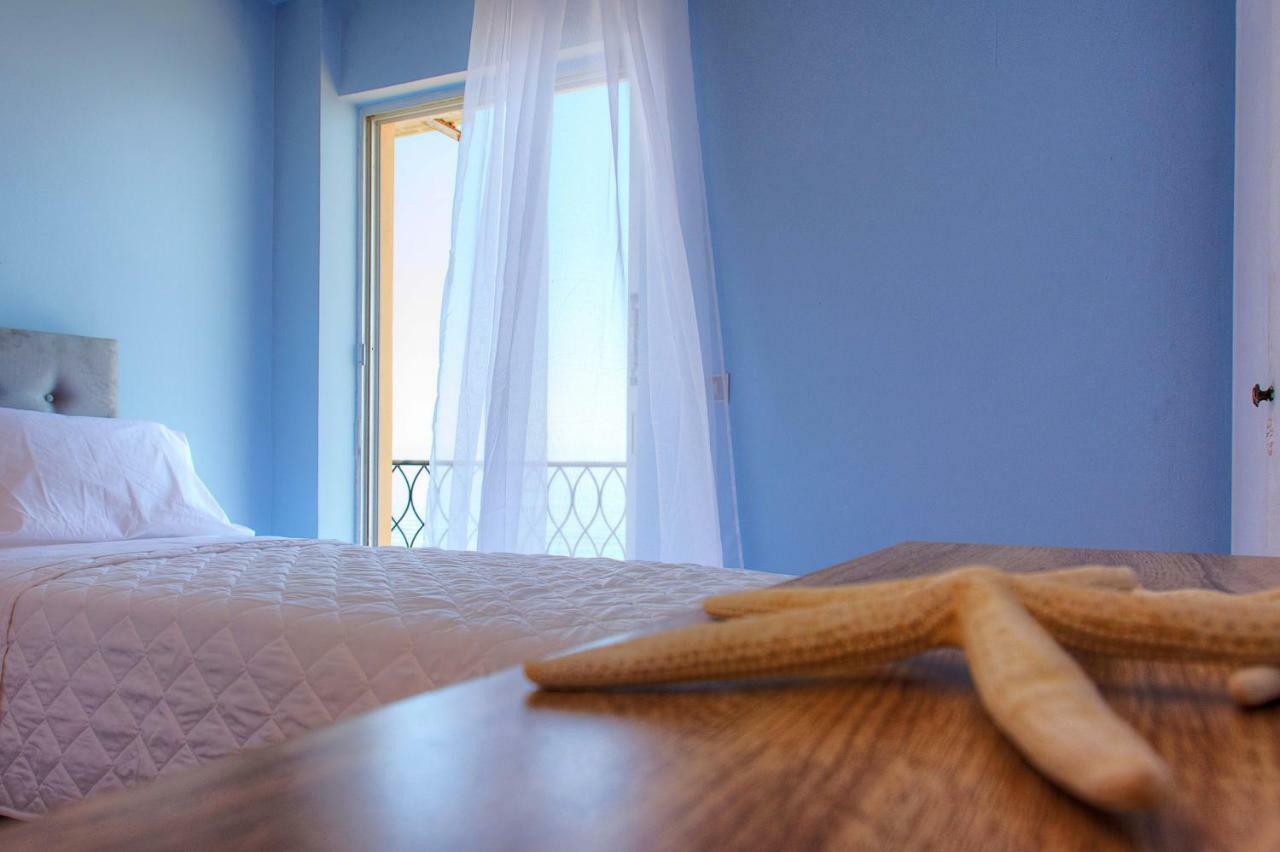 T8 Apartment On The Beach Benitses  Bagian luar foto